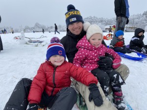 Shawn Maurer sledding with his kids